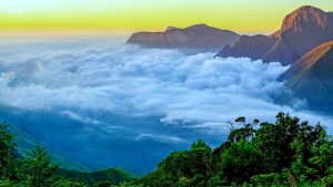 ToTop Station Munnar sunrise view with mist covered valleys